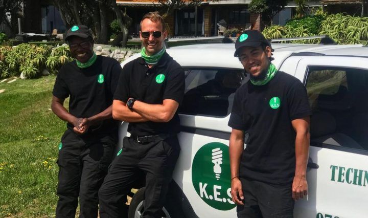 Lochlan, Jeremy and Nigel standing by the bakkie